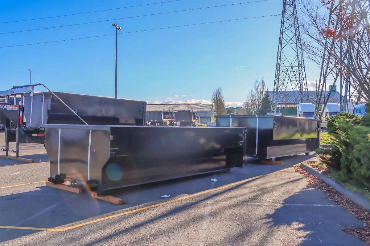 Roll-off dumpster ready for waste disposal at job site for 2 Yard Dumpster Rental in Berwick